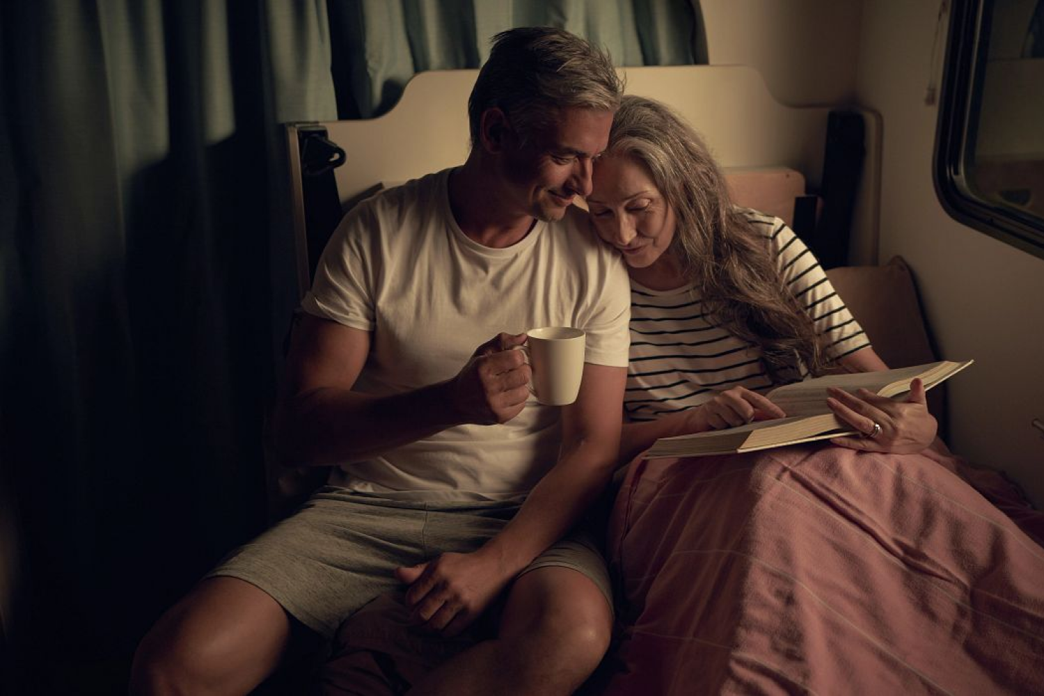 couple in lighting in motorhome