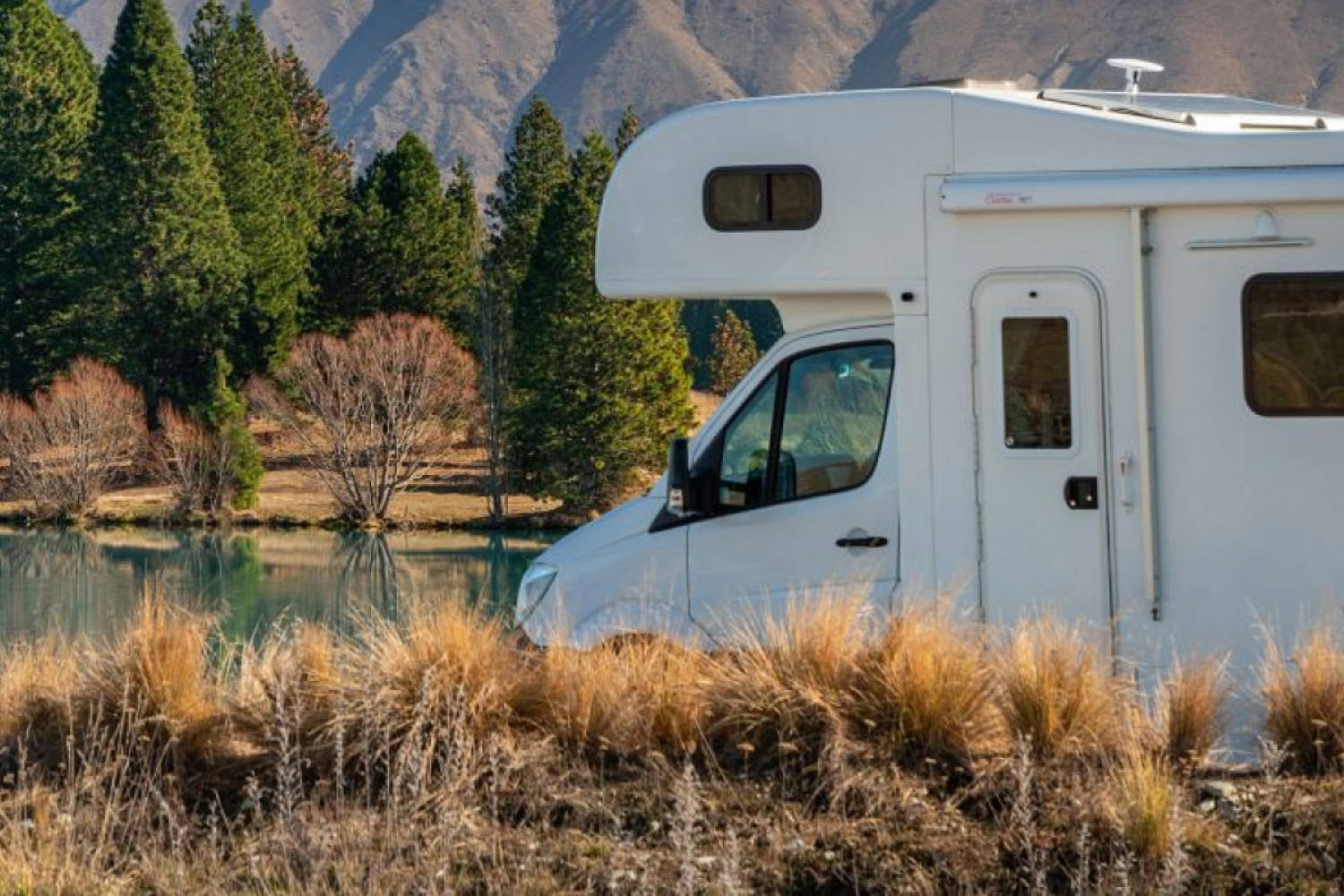 Motorhome parked up to nice scenery.