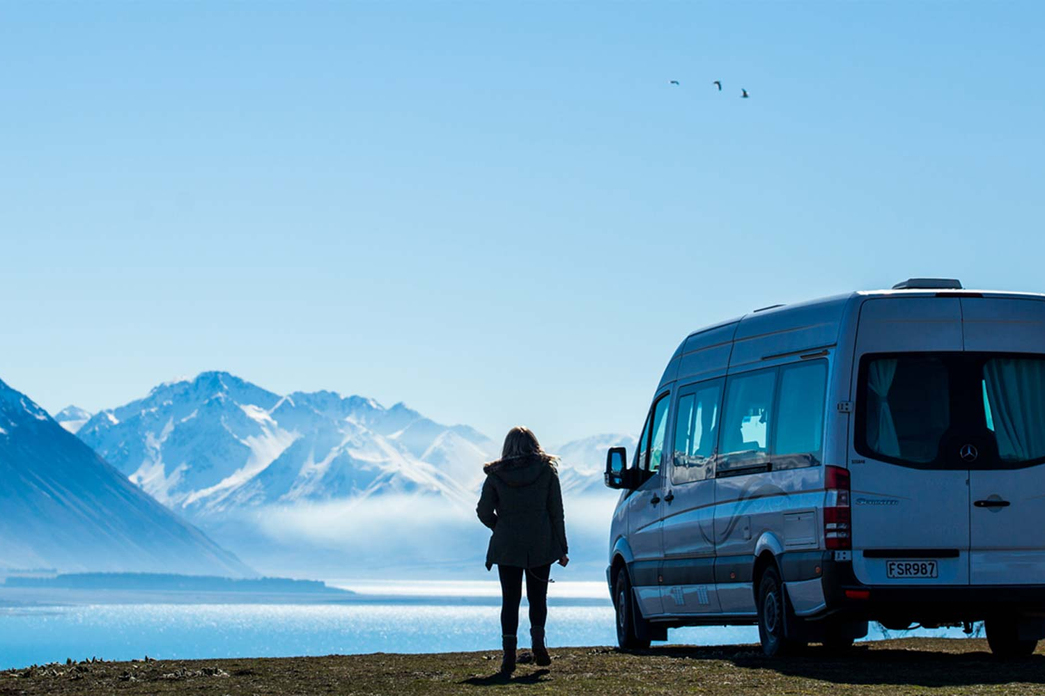 Winter mountains with KEA motorhome parked up next to it