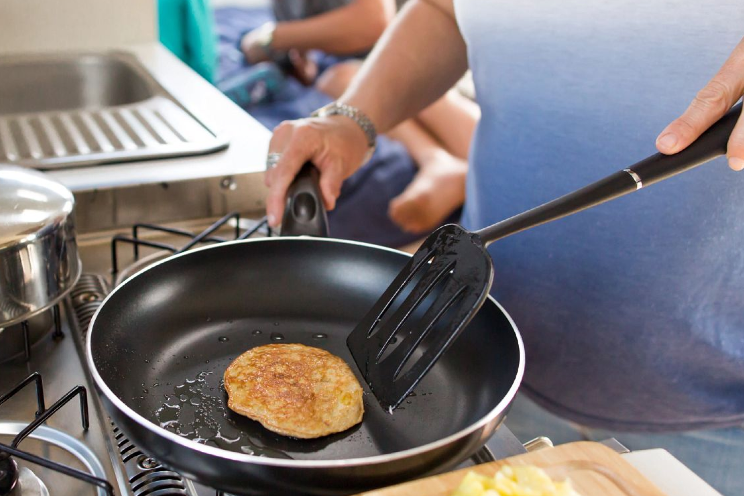 KEA RV kitchen cooking up a meal of pancakes on hob