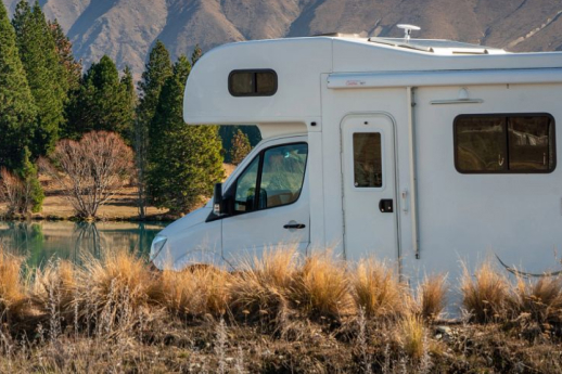 Motorhome parked up next to scenery