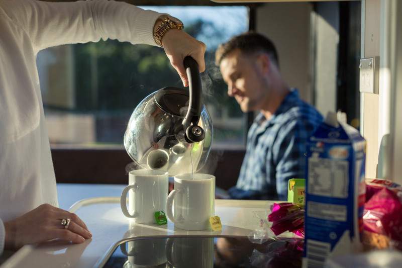 Hot drink in a campervan in winter